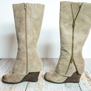 Woman's Fergie boots size 7.  Tan colored